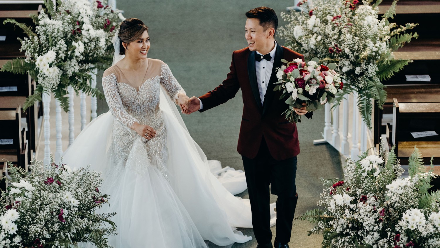 bridal-gown-with-embellished-bodice-and-burgundy-tuxedo